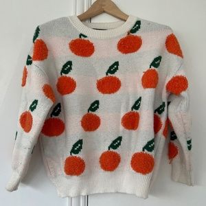 Cider reversible orange sweater
